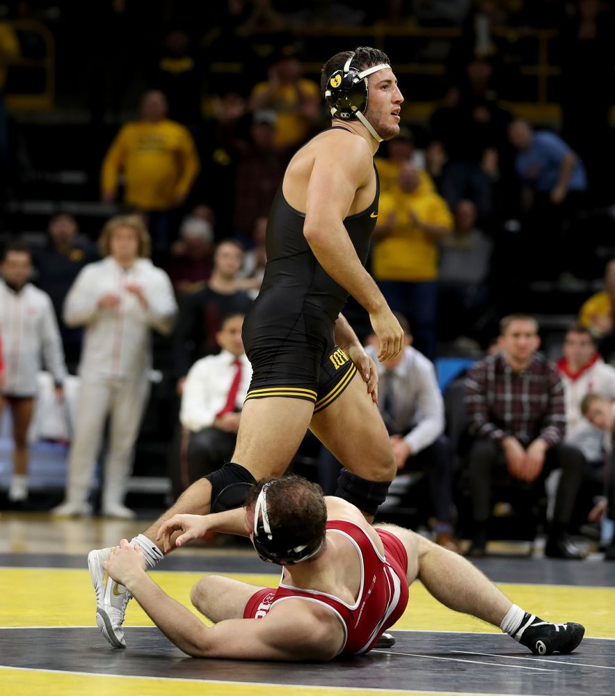 IowaÕs Michael Kemerer wrestles WisconsinÕs Jared Krattinger at 174 pounds Sunday, December 1, 2019 at Carver-Hawkeye Arena. Kemerer won the match with a fall. (Brian Ray/hawkeyesports.com)