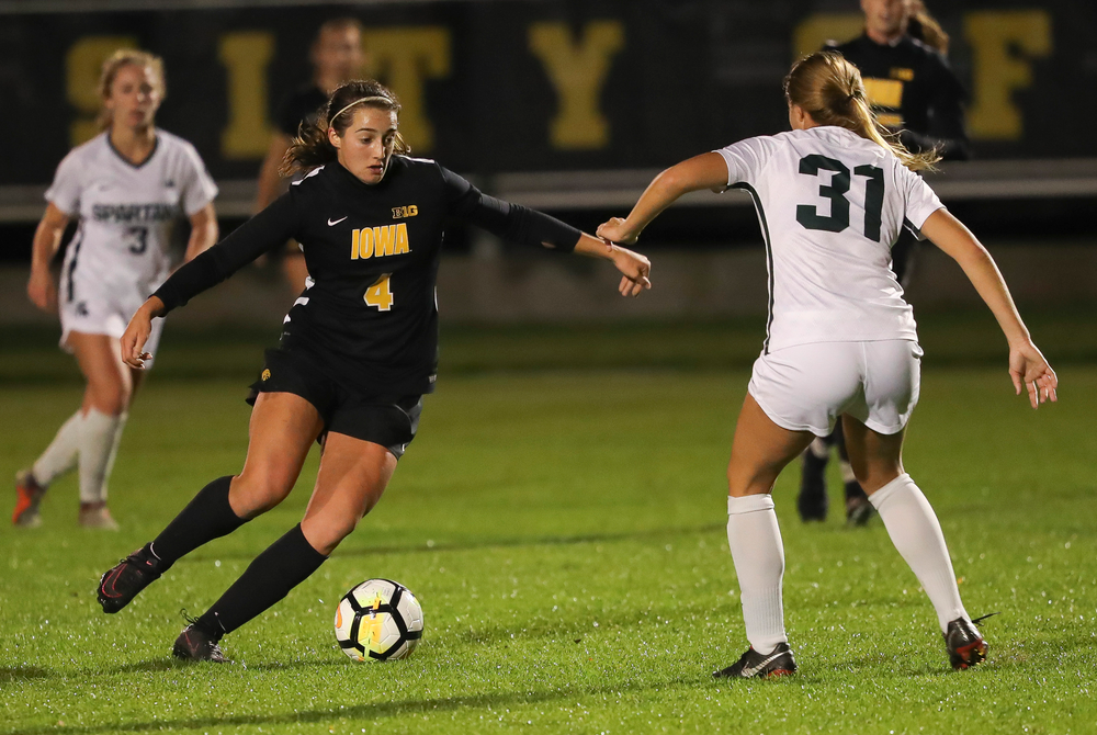 Iowa Hawkeyes forward Kaleigh Haus (4) dribbles the ball during a game against Michigan State at the Iowa Soccer Complex on October 12, 2018. (Tork Mason/hawkeyesports.com)
