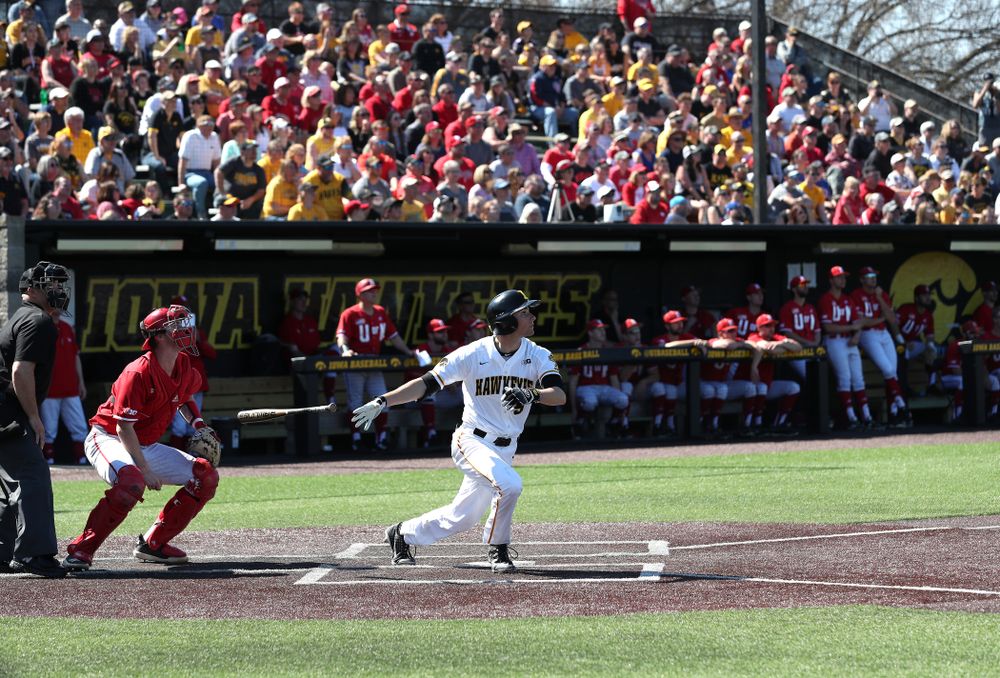 Iowa Hawkeyes outfielder Ben Norman (9) hits a home run against the Nebraska Cornhuskers Saturday, April 20, 2019 at Duane Banks Field. (Brian Ray/hawkeyesports.com)