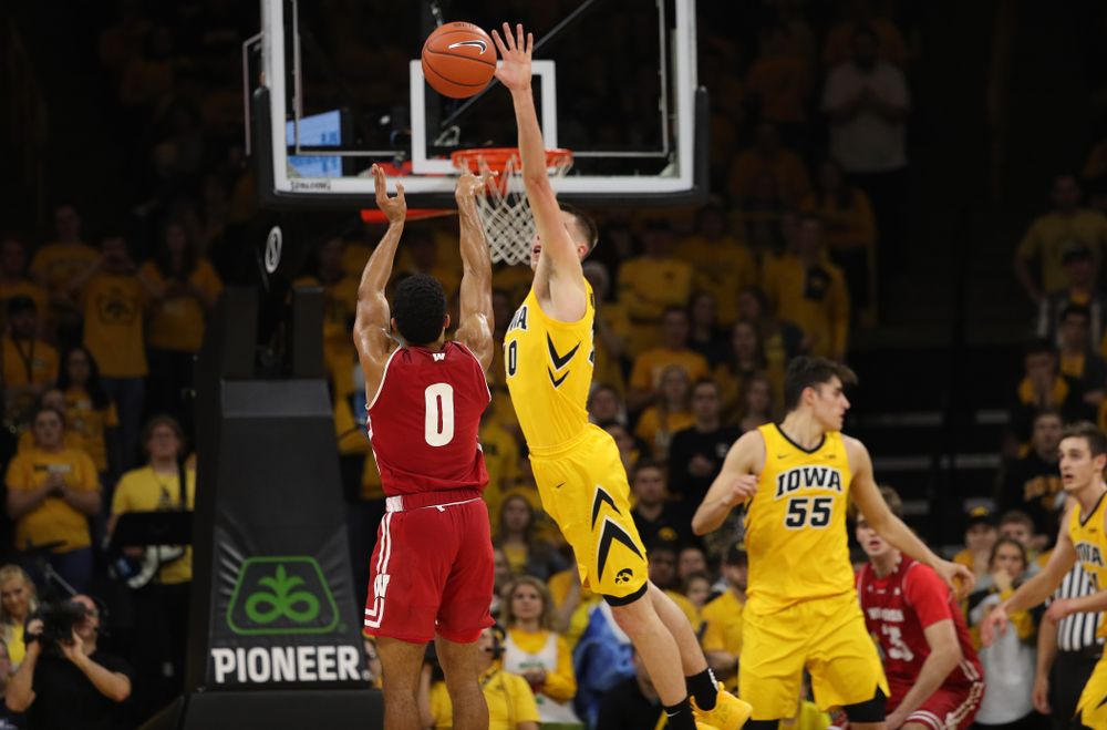 Iowa Hawkeyes guard Joe Wieskamp (10) blocks a shot against the Wisconsin Badgers Friday, November 30, 2018 at Carver-Hawkeye Arena. (Brian Ray/hawkeyesports.com)