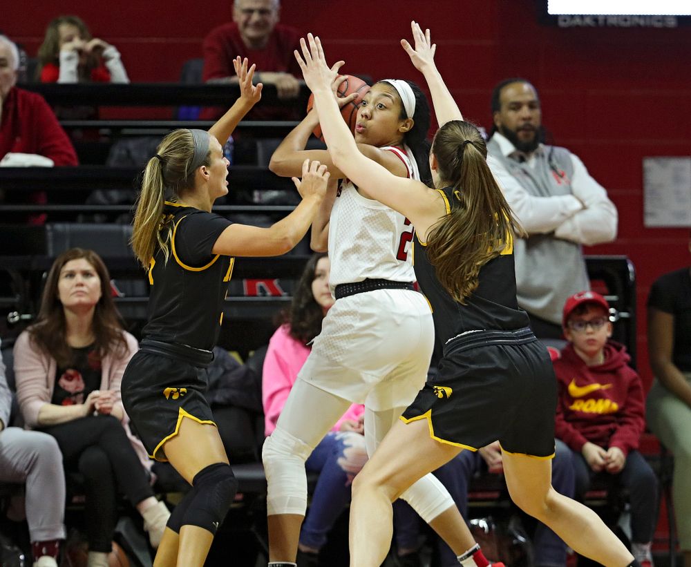 Iowa guard Makenzie Meyer (3) and forward Amanda Ollinger (43) defend during the fourth quarter of their game at the Rutgers Athletic Center in Piscataway, N.J. on Sunday, March 1, 2020. (Stephen Mally/hawkeyesports.com)