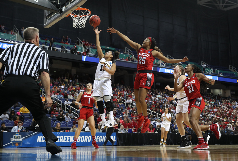Iowa Hawkeyes guard Tania Davis (11) against the NC State Wolfpack in the regional semi-final of the 2019 NCAA Women's College Basketball Tournament Saturday, March 30, 2019 at Greensboro Coliseum in Greensboro, NC.(Brian Ray/hawkeyesports.com)