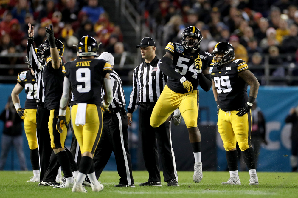 Iowa Hawkeyes defensive tackle Daviyon Nixon (54) celebrates a turnover against USC in the Holiday Bowl Friday, December 27, 2019 at San Diego Community Credit Union Stadium. (Brian Ray/hawkeyesports.com)