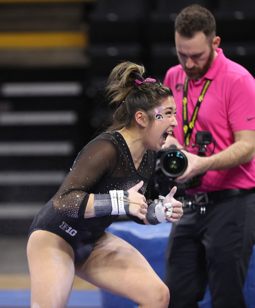 Iowa's Nicole Chow competes on the bars during their meet against the Minnesota Golden Gophers Saturday, January 19, 2019 at Carver-Hawkeye Arena. (Brian Ray/hawkeyesports.com)
