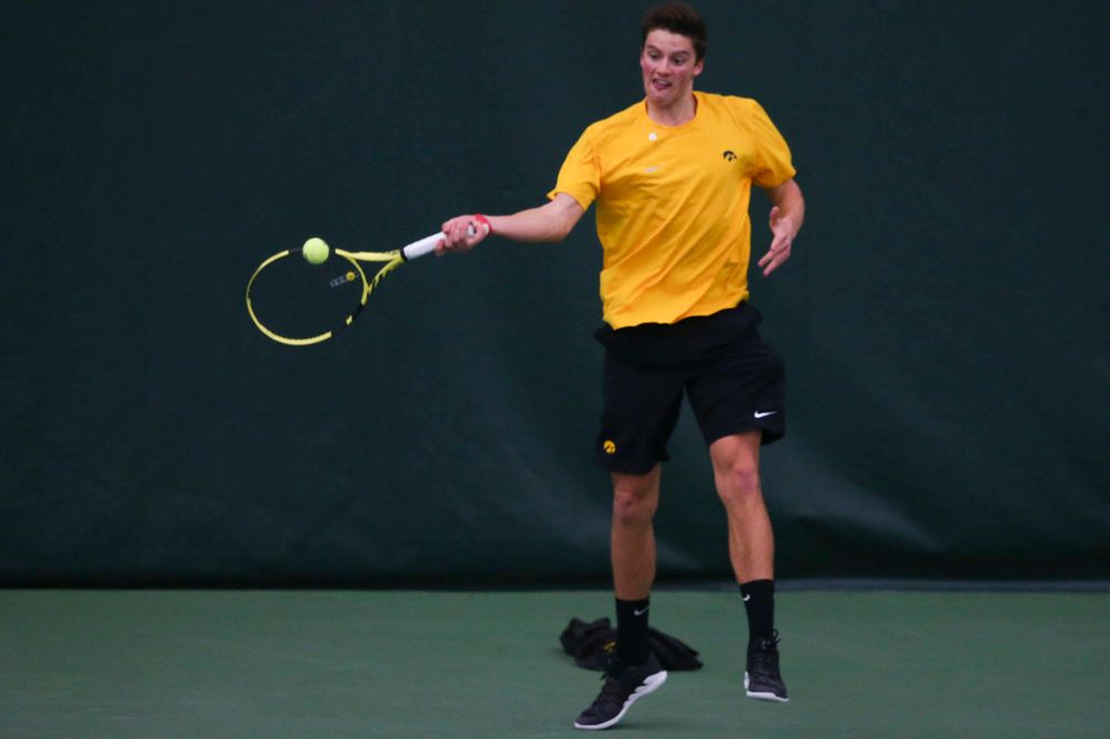 Iowa's Piotr Smietana at a tennis match vs Drake Friday, March 8, 2019 at the Hawkeye Tennis and Recreation Complex. (Lily Smith/hawkeyesports.com)