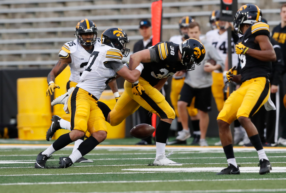 Iowa Hawkeyes tight end T.J. Hockenson (38) and defensive back Amani Hooker (27) during the final spring practice Friday, April 20, 2018 at Kinnick Stadium. (Brian Ray/hawkeyesports.com)