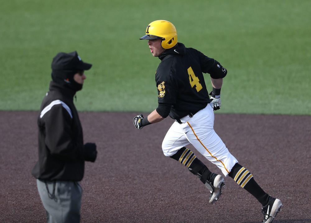 Iowa Hawkeyes infielder Mitchell Boe (4) reacts after hitting a game tying three-run homer against California State Northridge Sunday, March 17, 2019 at Duane Banks Field. (Brian Ray/hawkeyesports.com)