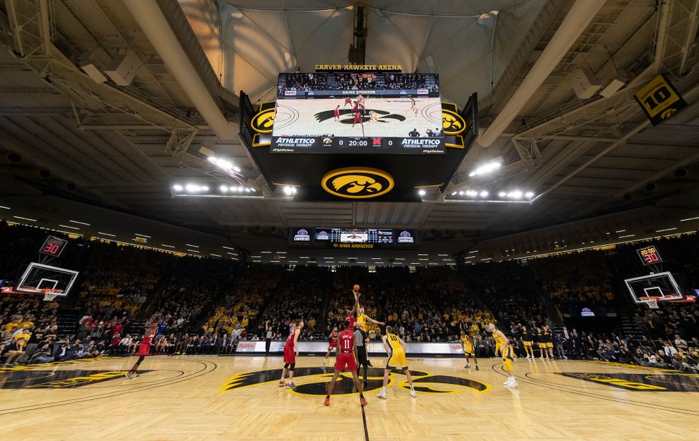 Iowa Hawkeyes forward Luka Garza (55) wins the tip against the Nebraska Cornhuskers Saturday, February 8, 2020 at Carver-Hawkeye Arena. (Brian Ray/hawkeyesports.com)