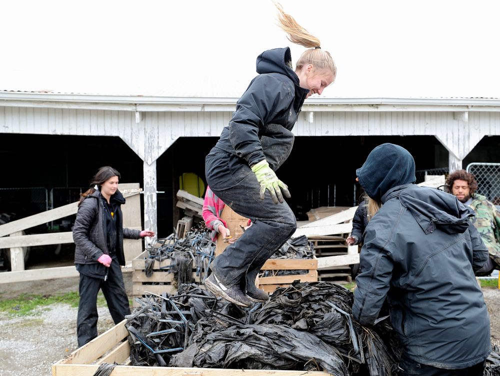 Iowa soccer players work at Grow: Johnson County at the Johnson County Historic Poor Farm during the 21st annual ISAAC Hawkeye Day of Caring in Iowa City on Sunday, Apr. 28, 2019. (Stephen Mally/hawkeyesports.com)