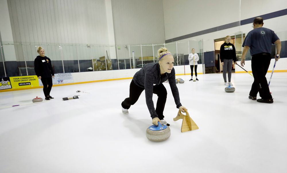 Members of the Iowa Softball team learn the sport of curling as part of a team building event Wednesday, January 10, 2018 at the Cedar Rapids Ice Arena. (Brian Ray/hawkeyesports.com)
