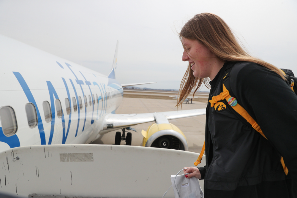 Iowa Hawkeyes center Monika Czinano (25) boards the team plane to Greensboro, NC for the Regionals of the 2019 NCAA Women's Basketball Championships Thursday, March 28, 2019 at the Eastern Iowa Airport. (Brian Ray/hawkeyesports.com)