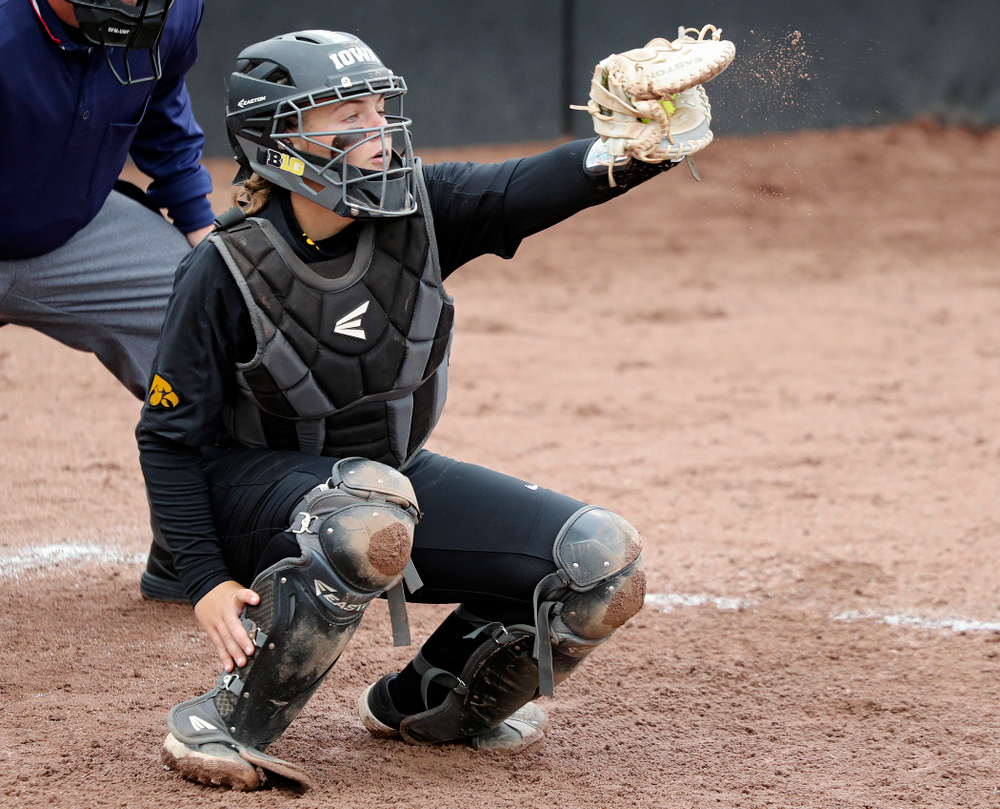 Iowa catcher Abby Lien (9) eyes a pitch during the fifth inning of their game against Iowa Softball vs Indian Hills Community College at Pearl Field in Iowa City on Sunday, Oct 6, 2019. (Stephen Mally/hawkeyesports.com)
