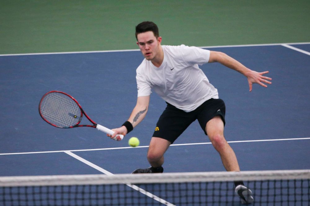 Iowa's Jonas Larsen at a tennis match vs Drake Friday, March 8, 2019 at the Hawkeye Tennis and Recreation Complex. (Lily Smith/hawkeyesports.com)