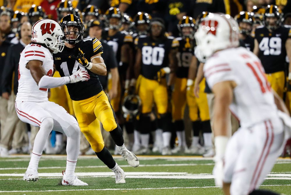 Iowa Hawkeyes wide receiver Kyle Groeneweg (14) runs downfield on punt coverage during a game against Wisconsin at Kinnick Stadium on September 22, 2018. (Tork Mason/hawkeyesports.com)