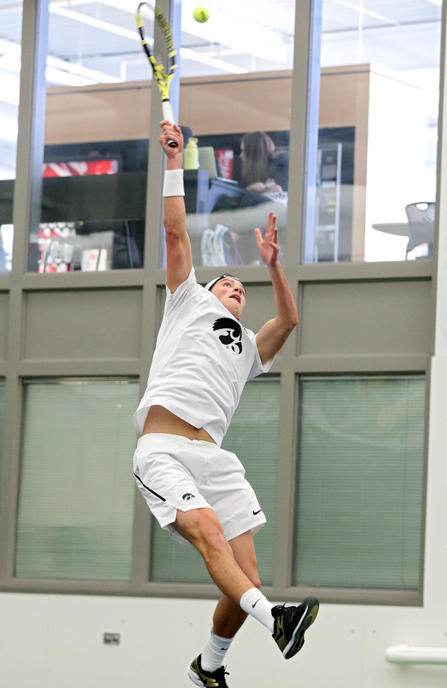 Iowa’s Joe Tyler returns a shot during his singles match at the Hawkeye Tennis and Recreation Complex in Iowa City on Sunday, February 16, 2020. (Stephen Mally/hawkeyesports.com)