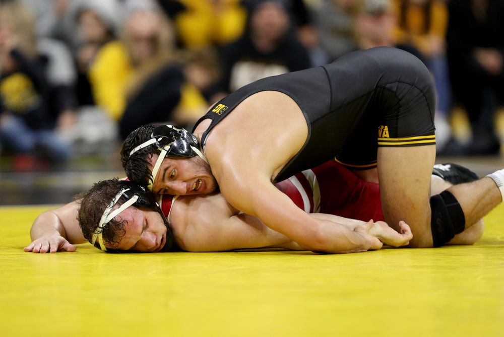 IowaÕs Michael Kemerer wrestles WisconsinÕs Jared Krattinger at 174 pounds Sunday, December 1, 2019 at Carver-Hawkeye Arena. Kemerer won the match with a fall. (Brian Ray/hawkeyesports.com)