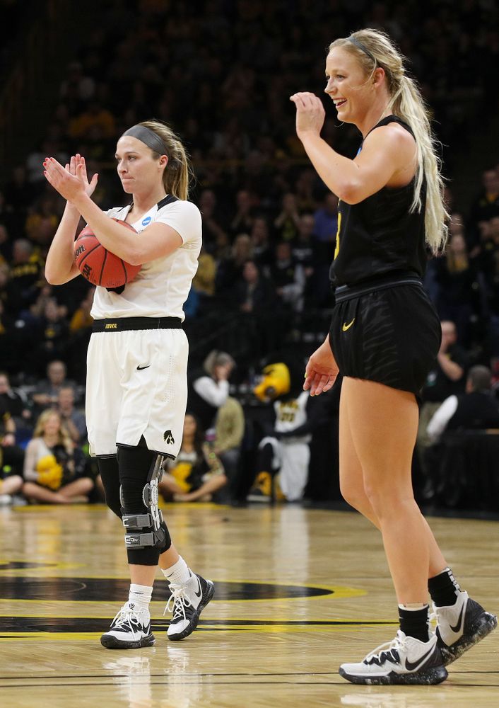 Iowa Hawkeyes guard Makenzie Meyer (3) claps after is was fouled by Missouri Tigers guard Sophie Cunningham (3) during the second quarter of their second round game in the 2019 NCAA Women's Basketball Tournament at Carver Hawkeye Arena in Iowa City on Sunday, Mar. 24, 2019. (Stephen Mally for hawkeyesports.com)