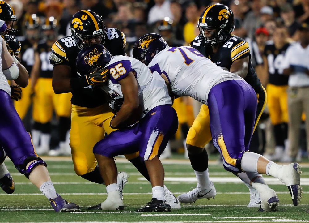 Iowa Hawkeyes defensive lineman Cedrick Lattimore (95) makes a tackle during a game against Northern Iowa at Kinnick Stadium on September 15, 2018. (Tork Mason/hawkeyesports.com)