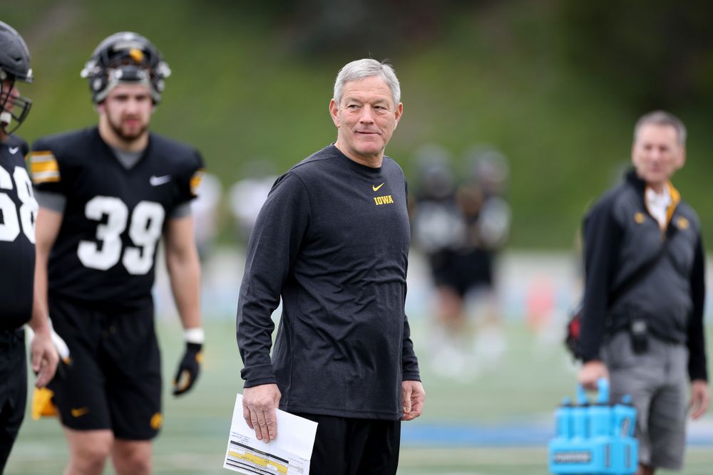 Iowa Hawkeyes head coach Kirk Ferentz smiles during practice Sunday, December 22, 2019 at Mesa College in San Diego. (Brian Ray/hawkeyesports.com)