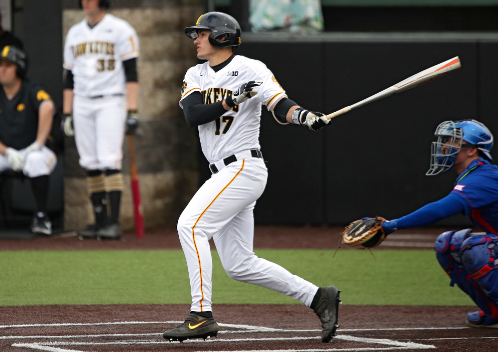 Iowa shortstop Dylan Nedved (17) hits an RBI double during the fourth inning of their college baseball game at Duane Banks Field in Iowa City on Wednesday, March 11, 2020. (Stephen Mally/hawkeyesports.com)