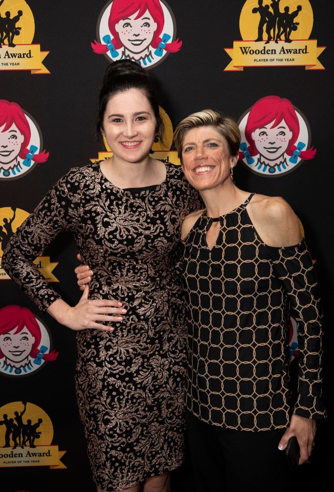 Iowa Hawkeyes forward Megan Gustafson (10) and associate head coach Jan Jensen on the red carpet before the ESPN College Basketball Awards show Friday, April 12, 2019 at The Novo at LA Live. (Brian Ray/hawkeyesports.com)