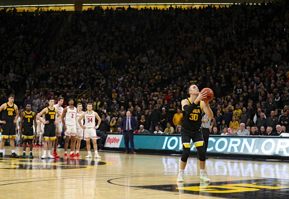 Iowa Hawkeyes guard Connor McCaffery (30) shoots a free throw after a technical foul was called on the Wisconsin Badgers during the second half of their game at Carver-Hawkeye Arena in Iowa City on Monday, January 27, 2020. (Stephen Mally/hawkeyesports.com)