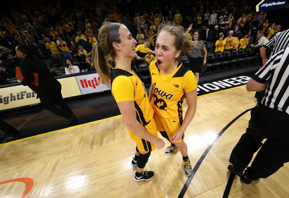 Iowa Hawkeyes guard Kathleen Doyle (22) celebrates with guard Makenzie Meyer (3) following their victory against the Maryland Terrapins Thursday, January 9, 2020 at Carver-Hawkeye Arena. (Brian Ray/hawkeyesports.com)