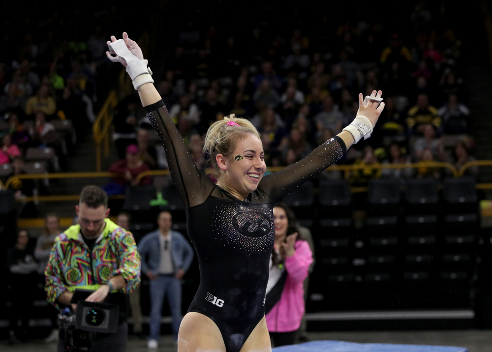 Iowa’s Alex Greenwald competes on the bars against Michigan Friday, February 14, 2020 at Carver-Hawkeye Arena. (Brian Ray/hawkeyesports.com)