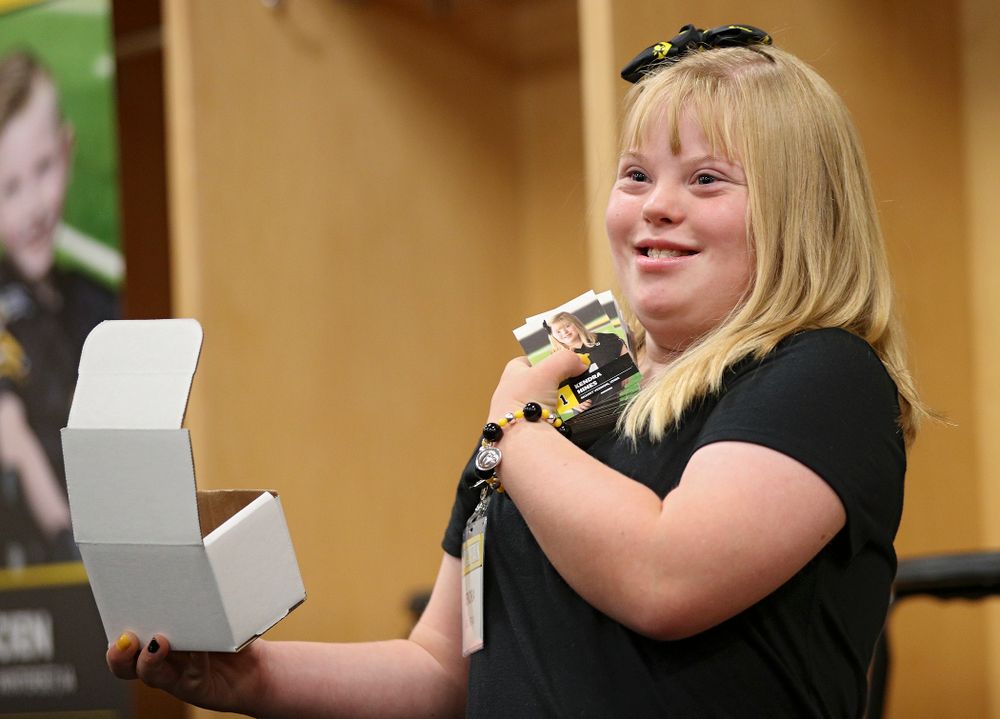 Kid Captain Kendra Hines holds up her trading cards during Kids Day at Kinnick Stadium in Iowa City on Saturday, Aug 10, 2019. (Stephen Mally/hawkeyesports.com)