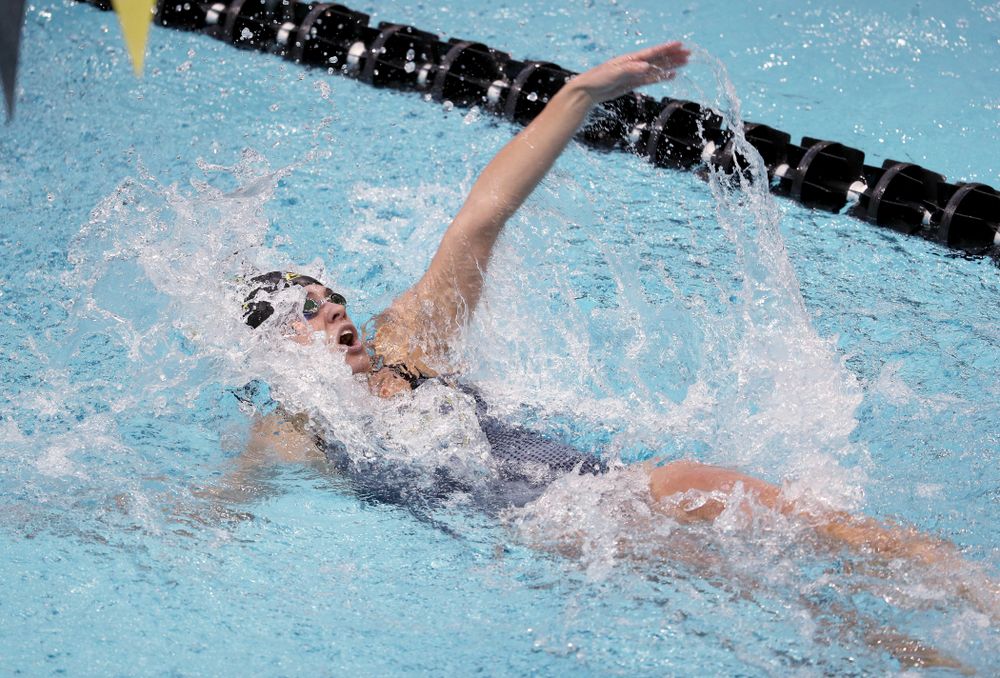 IowaÕs Kennedy Gilbertson competes in the 100 yard backstroke against Notre Dame and Illinois Saturday, January 11, 2020 at the Campus Recreation and Wellness Center. (Brian Ray/hawkeyesports.com)