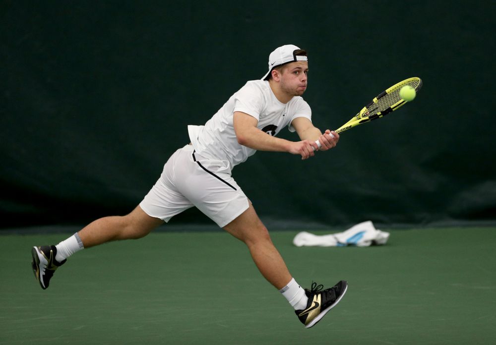 Iowa’s Will Davies against Cornell Sunday, March 8, 2020 at the Hawkeye Tennis and Recreation Center. (Brian Ray/hawkeyesports.com)