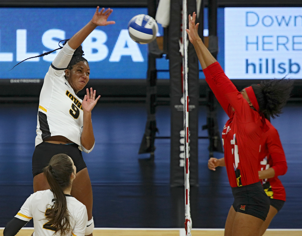 Iowa’s Amiya Jones (9) drives a shot during the first set of their match at Carver-Hawkeye Arena in Iowa City on Saturday, Nov 30, 2019. (Stephen Mally/hawkeyesports.com)