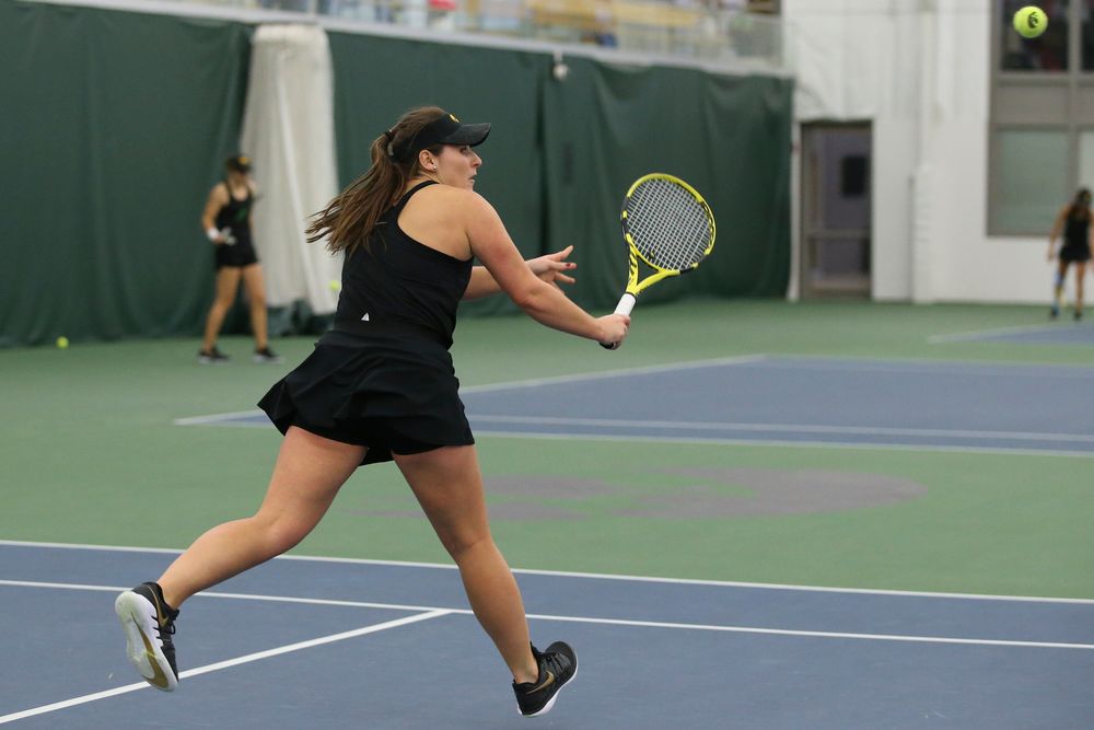 Iowa’s Danielle Bauers returns a hit during the Iowa women’s tennis meet vs UNI on Saturday, February 29, 2020 at the Hawkeye Tennis and Recreation Complex. (Lily Smith/hawkeyesports.com)