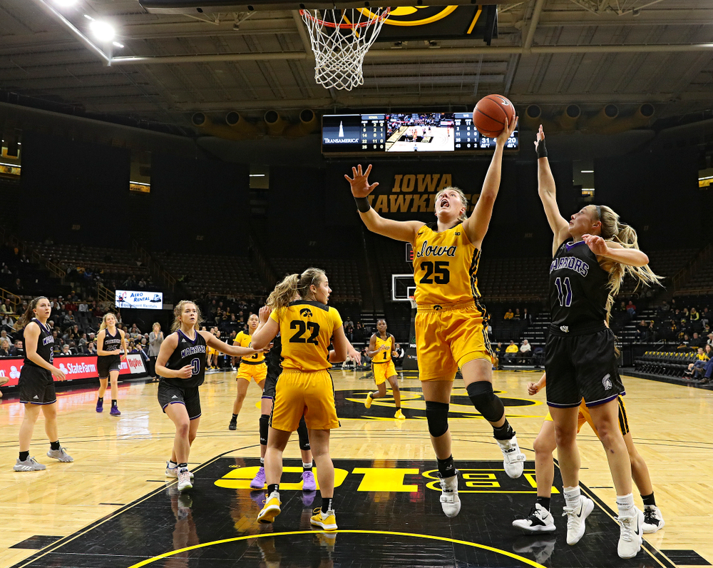 Iowa forward/center Monika Czinano (25) puts up a shot during the second quarter of their game against Winona State at Carver-Hawkeye Arena in Iowa City on Sunday, Nov 3, 2019. (Stephen Mally/hawkeyesports.com)