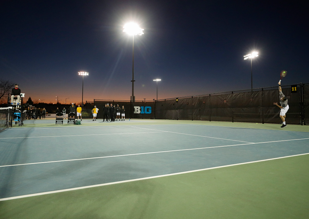 Iowa's Jonas Larsen serves during his match again Michigan State at the Hawkeye Tennis and Recreation Complex in Iowa City on Friday, Apr. 19, 2019. (Stephen Mally/hawkeyesports.com)
