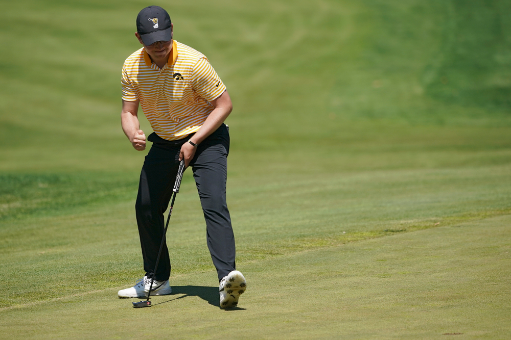 Iowa's Matthew Walker pumps his fist after making a putt during the third round of the Hawkeye Invitational at Finkbine Golf Course in Iowa City on Sunday, Apr. 21, 2019. (Stephen Mally/hawkeyesports.com)