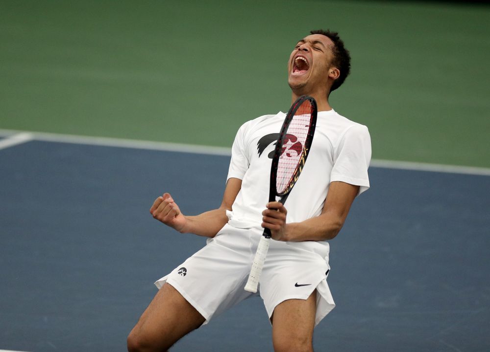 Iowa’s Will Davies and Oliver Okonkwo celebrates a point against Cornell Sunday, March 8, 2020 at the Hawkeye Tennis and Recreation Center. (Brian Ray/hawkeyesports.com)
