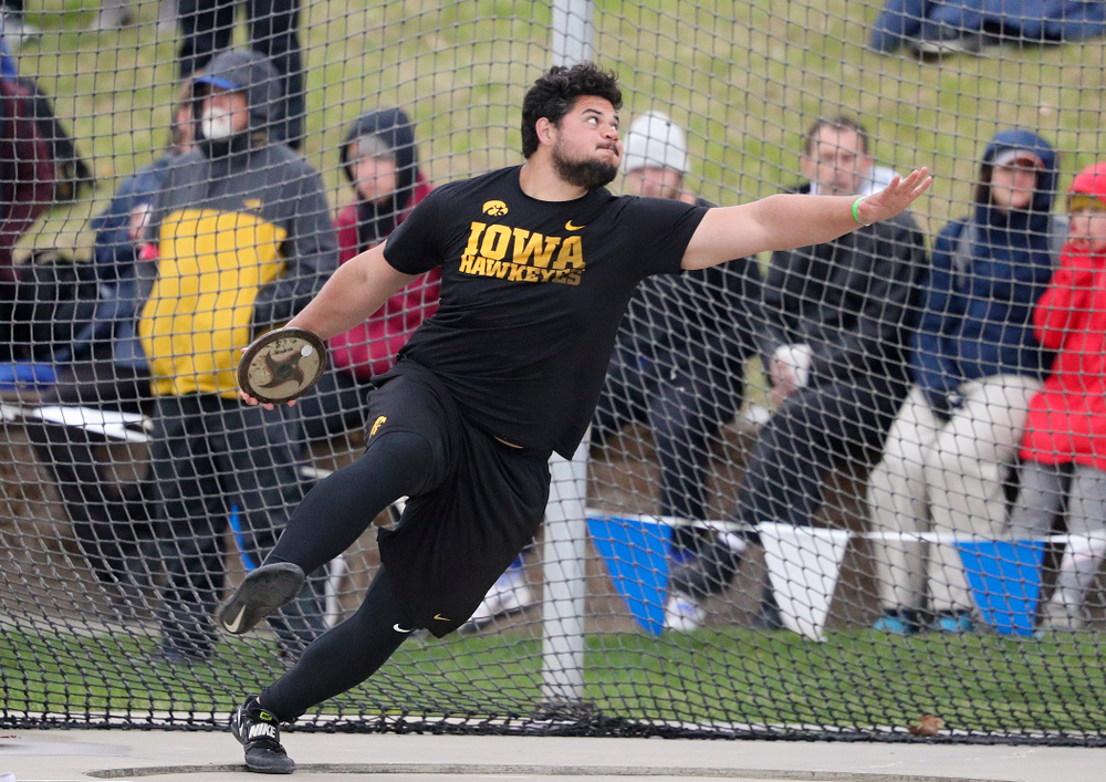 Iowa's Reno Tuufuli throws in the men's discus event during the third day of the Drake Relays at Drake Stadium in Des Moines on Saturday, Apr. 27, 2019. (Stephen Mally/hawkeyesports.com)