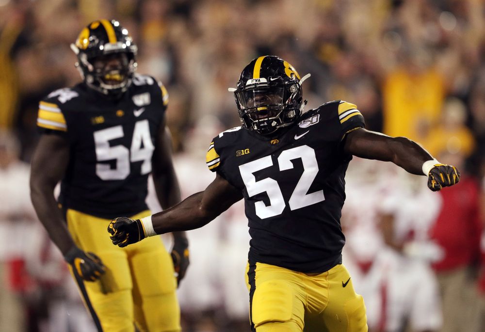 Iowa Hawkeyes linebacker Amani Jones (52) celebrates a sack against the Miami RedHawks Saturday, August 31, 2019 at Kinnick Stadium in Iowa City. (Brian Ray/hawkeyesports.com)