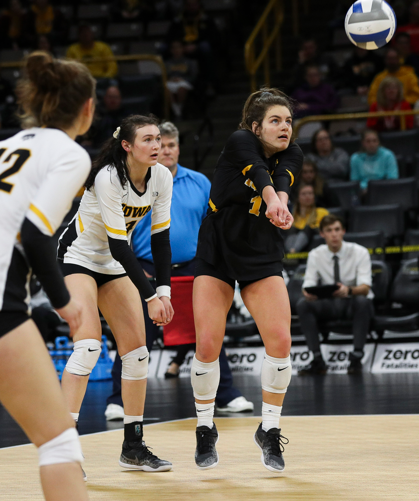 Iowa Hawkeyes defensive specialist Molly Kelly (1) bumps the ball during a match against Maryland at Carver-Hawkeye Arena on November 23, 2018. (Tork Mason/hawkeyesports.com)