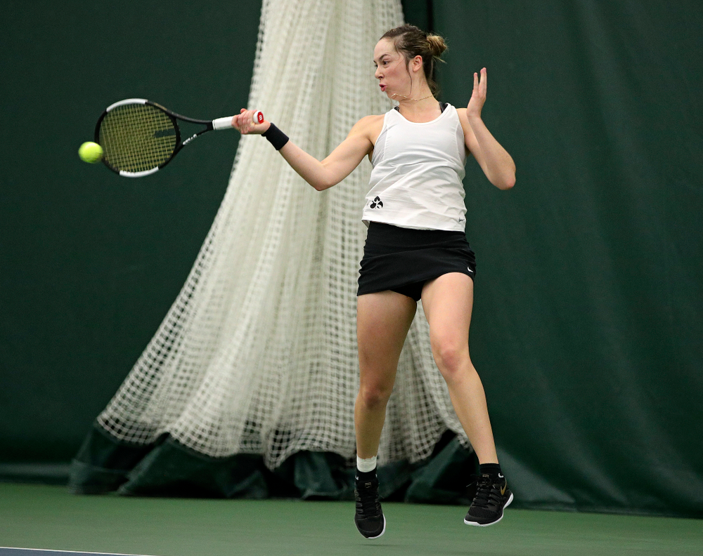 Iowa’s Samantha Mannix returns a shot during her doubles match at the Hawkeye Tennis and Recreation Complex in Iowa City on Sunday, February 23, 2020. (Stephen Mally/hawkeyesports.com)