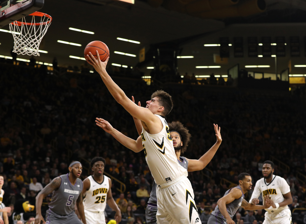 Iowa Hawkeyes forward Luka Garza (55) against the Northwestern Wildcats Sunday, February 10, 2019 at Carver-Hawkeye Arena. (Brian Ray/hawkeyesports.com)