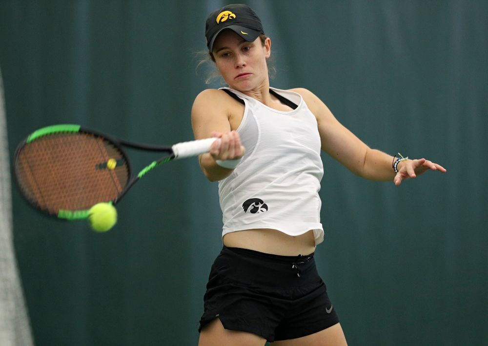 Iowa’s Elise Van Heuvelen returns a shot during her singles match at the Hawkeye Tennis and Recreation Complex in Iowa City on Sunday, February 23, 2020. (Stephen Mally/hawkeyesports.com)