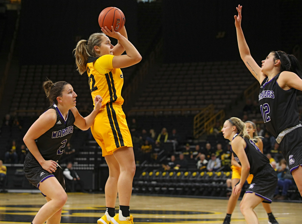 Iowa guard Kathleen Doyle (22) makes a basket during the first quarter of their game against Winona State at Carver-Hawkeye Arena in Iowa City on Sunday, Nov 3, 2019. (Stephen Mally/hawkeyesports.com)