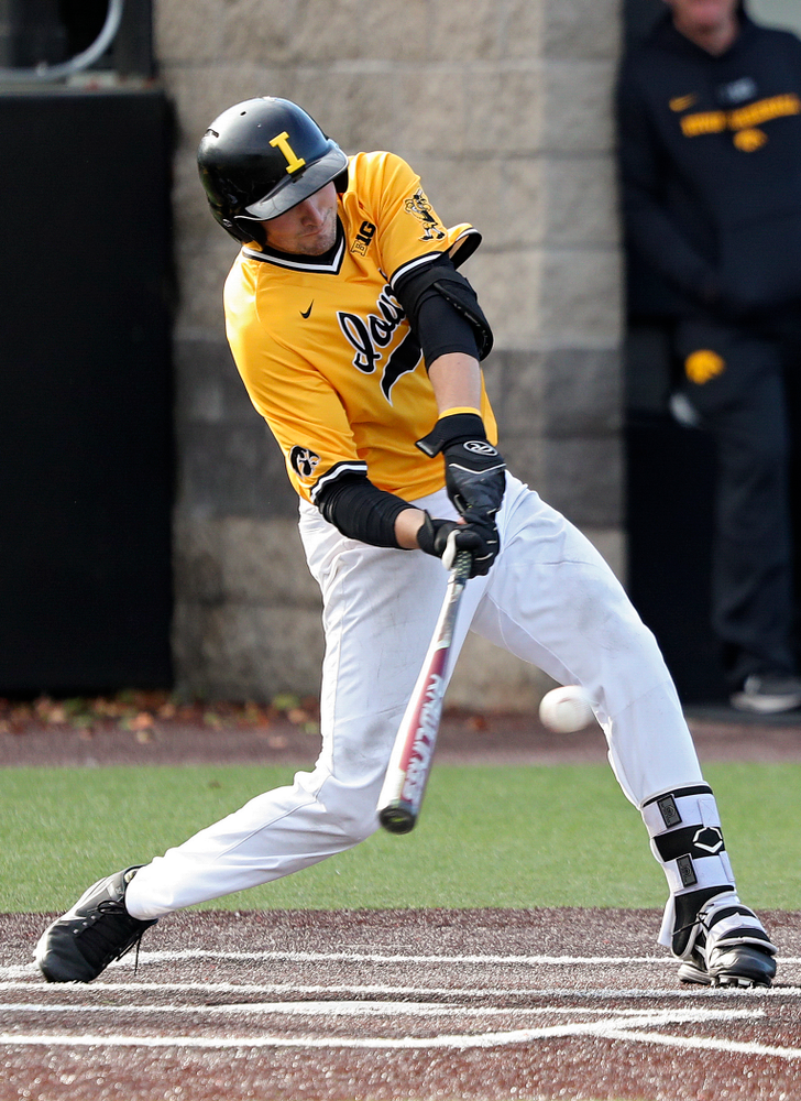 Iowa catcher Brett McCleary (32) drives a pitch for a hit during the third inning of the first game of the Black and Gold Fall World Series at Duane Banks Field in Iowa City on Tuesday, Oct 15, 2019. (Stephen Mally/hawkeyesports.com)