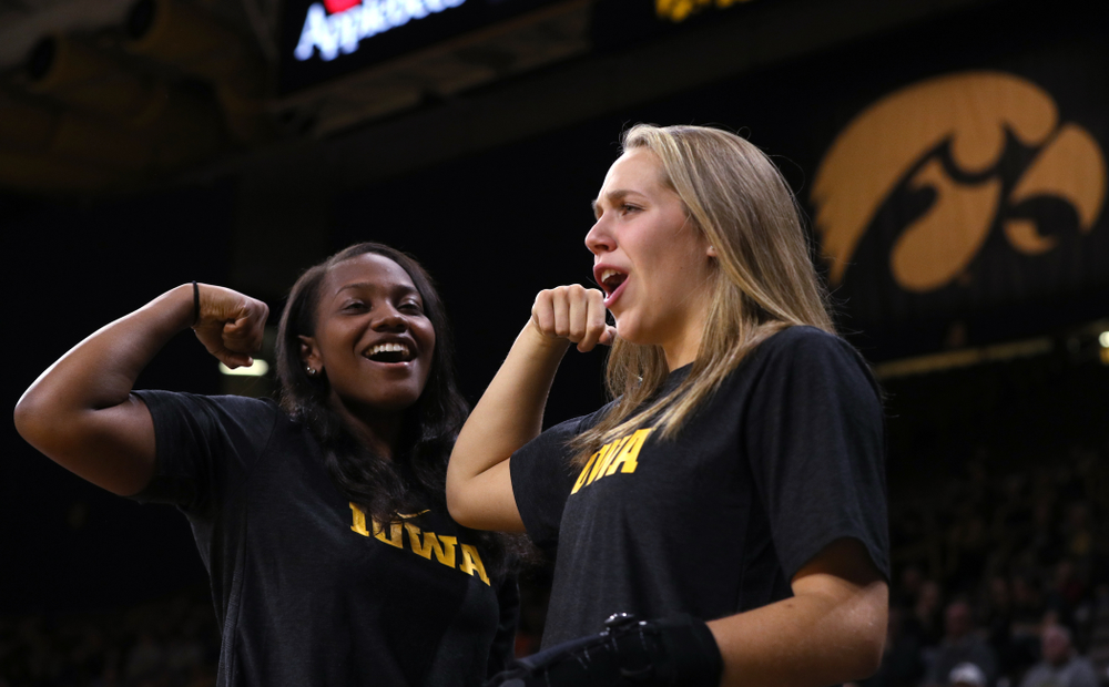 Iowa Hawkeyes guard Zion Sanders (24) and guard Kathleen Doyle (22) against Dakota Wesleyan University Tuesday, November 6, 2018 at Carver-Hawkeye Arena. (Brian Ray/hawkeyesports.com)