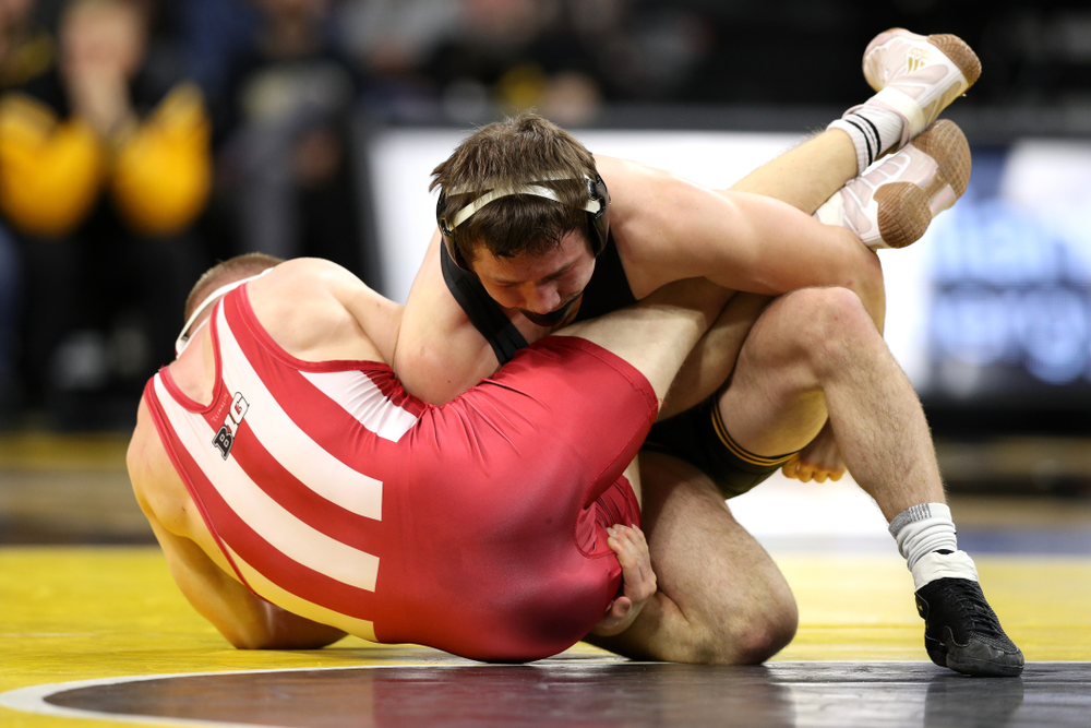 Iowa's Jaren Glosser wrestles Indiana's Jake Danishek at 157 pounds Friday, February 15, 2019 at Carver-Hawkeye Arena. (Brian Ray/hawkeyesports.com)