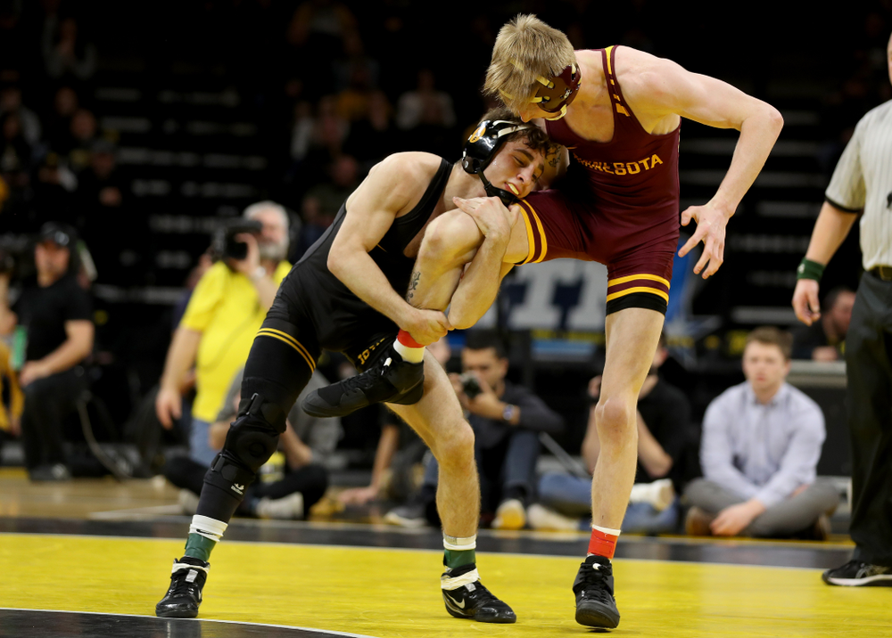 Iowa’s Austin DeSanto wrestles Minnesota’s Boo Dryden at 133 pounds Saturday, February 15, 2020 at Carver-Hawkeye Arena. DeSanto won the match 24-8. (Brian Ray/hawkeyesports.com)