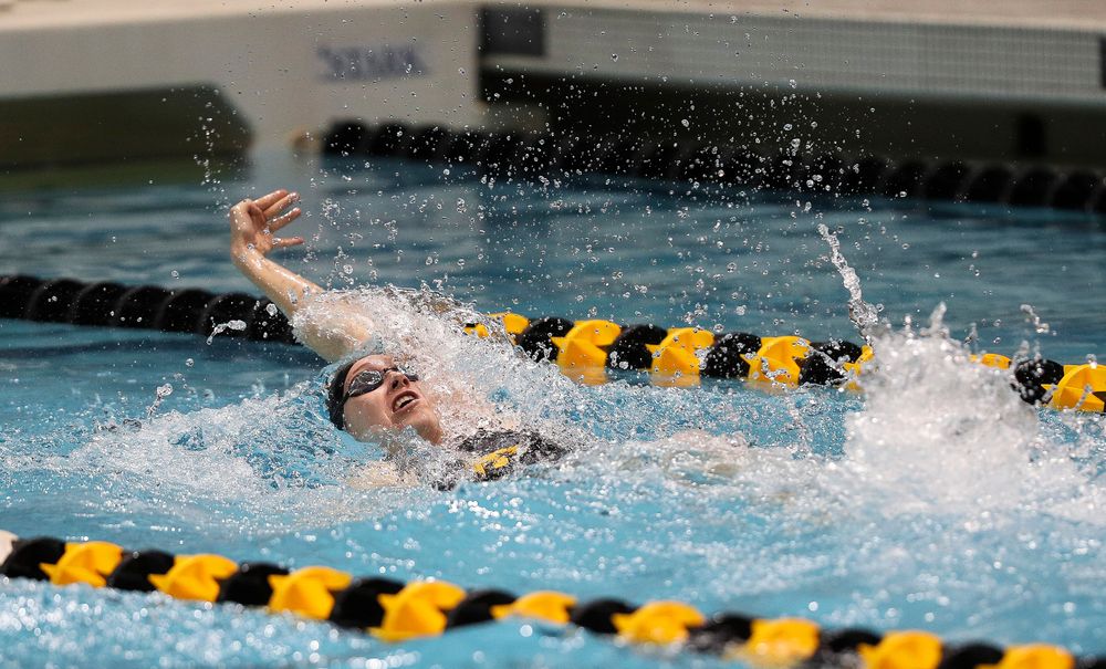 Iowa's Samantha Sauer competes in the 100-yard backstroke during the third day of the Hawkeye Invitational at the Campus Recreation and Wellness Center on November 16, 2018. (Tork Mason/hawkeyesports.com)