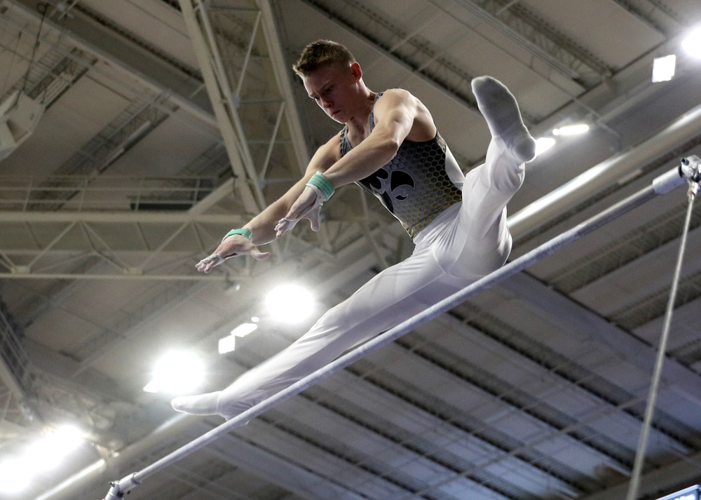 Iowa’s Carter Tope competes on the high bar against UIC and Minnesota Saturday, February 1, 2020 at Carver-Hawkeye Arena. (Brian Ray/hawkeyesports.com)